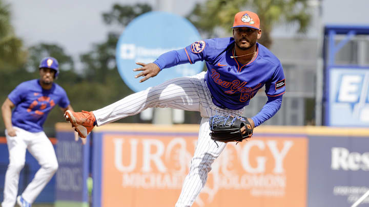 Feb 17, 2026; Port St. Lucie, FL, USA;  New York Mets pitcher Freddy Peralta (51) throws a pitch during the New York Mets spring training workouts at Clover Park. Mandatory Credit: Reinhold Matay-Imagn Images