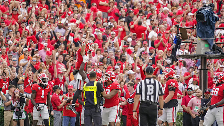 Nov 5, 2022; Athens, Georgia, USA; Georgia Bulldogs quarterback Stetson Bennett (13) is lifted by