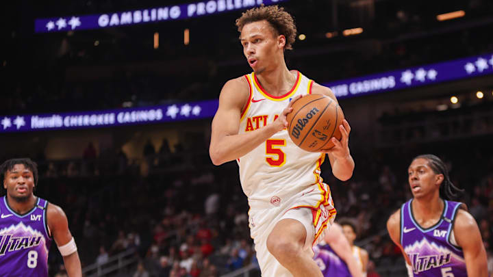 Feb 5, 2026; Atlanta, Georgia, USA; Atlanta Hawks guard Dyson Daniels (5) passes the ball against the Utah Jazz in the first quarter at State Farm Arena. Mandatory Credit: Brett Davis-Imagn Images
