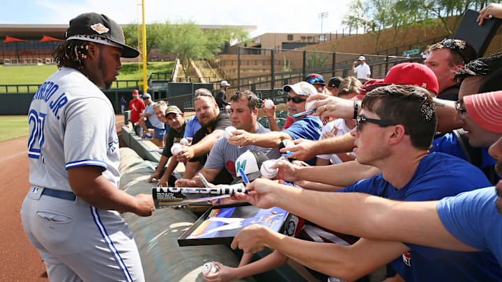 The Surprise Saguaros? Vladimir Guerrero Jr. signs autographs before an Arizona Fall League game on Oct. 23 at Salt River Fields. Guerrero is the son of Baseball Hall of Famer Vlad Guerrero Sr. 
 Photos by Rob Schumacher/The Republic
Surprise Saguaros Vladimir Guerrero Jr. signs autographs before during a game Oct. 23 at Salt River Fields at Talking Stick.

Arizona Fall League