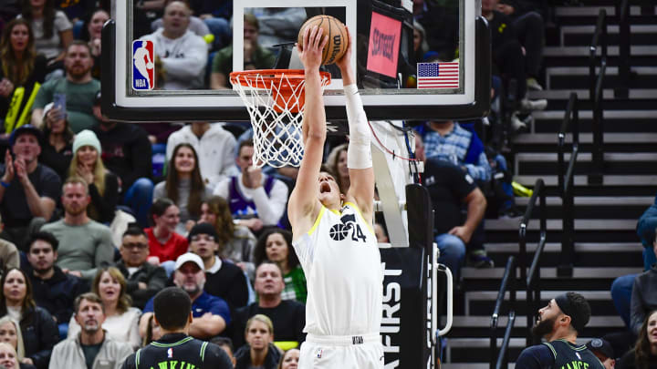 Nov 25, 2023; Salt Lake City, Utah, USA; Utah Jazz center Walker Kessler (24) dunks over New Orleans Pelicans guard Jordan Hawkins (24) and forward/center Larry Nance Jr. (22) during the second half at Delta Center. Nov 25, 2023; Salt Lake City, Utah, USA; Utah Jazz center Walker Kessler (24) dunks over New Orleans Pelicans guard Jordan Hawkins (24) and forward/center Larry Nance Jr. (22) during the second half at Delta Center.