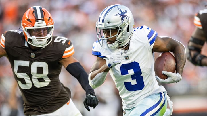 Sep 8, 2024; Cleveland, Ohio, USA; Dallas Cowboys wide receiver Brandin Cooks (3) runs the ball past Cleveland Browns linebacker Jordan Hicks (58) during the fourth quarter at Huntington Bank Field.