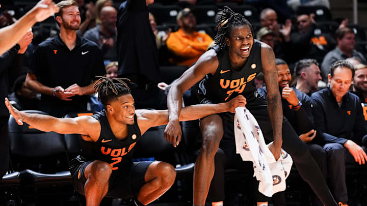 Tennessee guard Chaz Lanier (2) and Tennessee forward Felix Okpara (34) celebrate an offensive play by Tennessee guard Grant Hurst, not pictured, during a college basketball game between Tennessee and Syracuse held at Thompson-Boling Arena at Food City Center in Knoxville, Tenn., on Tuesday, Dec. 3, 2024.