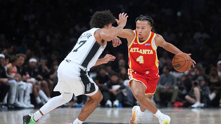 Oct 8, 2026; San Antonio, Texas, USA; Atlanta Hawks guard Kingston Flemings (4) looks to pass the ball while defended by San Antonio Spurs guard Ja'Kobi Gillespie (17) during the second half at Frost Bank Center. Mandatory Credit: Scott Wachter-Imagn Images Oct 8, 2026; San Antonio, Texas, USA; Atlanta Hawks guard Kingston Flemings (4) looks to pass the ball while defended by San Antonio Spurs guard Ja'Kobi Gillespie (17) during the second half at Frost Bank Center. Mandatory Credit: Scott Wachter-Imagn Images