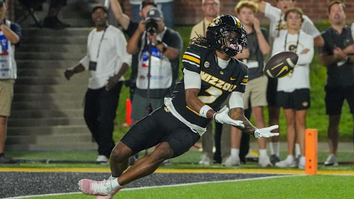 Aug 28, 2025; Columbia, Missouri, USA; Missouri Tigers wide receiver Marquis Johnson (2) catches a pass against the Central Arkansas Bears during the game at Faurot Field at Memorial Stadium. Mandatory Credit: Denny Medley-Imagn Images