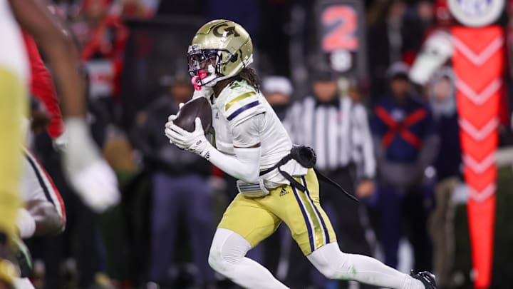 Nov 29, 2024; Athens, Georgia, USA; Georgia Tech Yellow Jackets wide receiver Eric Singleton Jr. (2) runs after a catch against the Georgia Bulldogs in the third quarter at Sanford Stadium. Mandatory Credit: Brett Davis-Imagn Images