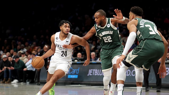 Feb 28, 2023; Brooklyn, New York, USA; Brooklyn Nets guard Cam Thomas (24) controls the ball against Milwaukee Bucks forward Khris Middleton (22) and forward Giannis Antetokounmpo (34) during the first quarter at Barclays Center. Mandatory Credit: Brad Penner-Imagn Images Feb 28, 2023; Brooklyn, New York, USA; Brooklyn Nets guard Cam Thomas (24) controls the ball against Milwaukee Bucks forward Khris Middleton (22) and forward Giannis Antetokounmpo (34) during the first quarter at Barclays Center. Mandatory Credit: Brad Penner-Imagn Images