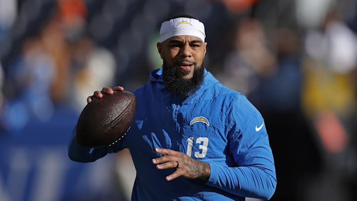 Jan 4, 2026; Denver, Colorado, USA; Los Angeles Chargers wide receiver Keenan Allen (13) warms up before the game against the Denver Broncos at Empower Field at Mile High. Mandatory Credit: Isaiah J. Downing-Imagn Images