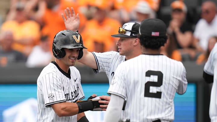 Vanderbilt infielder Mike Mancini (5) celebrates after scoring a run during a NCAA baseball game between the Tennessee Volunteers and Vanderbilt Commodores at Lindsey Nelson Stadium on May 11, 2025.
