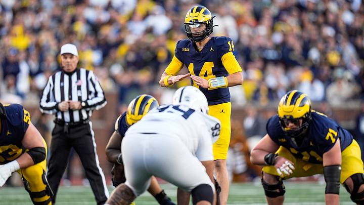 Michigan quarterback Tommy Carr (14) calls for a snap against Penn State during the second half at Michigan Stadium in Ann Arbor on Saturday, Oct. 17, 2026.