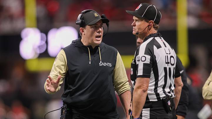 Jan 4, 2026; Atlanta, Georgia, USA; New Orleans Saints head coach Kellen Moore talks to a referee against the Atlanta Falcons in the third quarter at Mercedes-Benz Stadium. Mandatory Credit: Brett Davis-Imagn Images Jan 4, 2026; Atlanta, Georgia, USA; New Orleans Saints head coach Kellen Moore talks to a referee against the Atlanta Falcons in the third quarter at Mercedes-Benz Stadium. Mandatory Credit: Brett Davis-Imagn Images