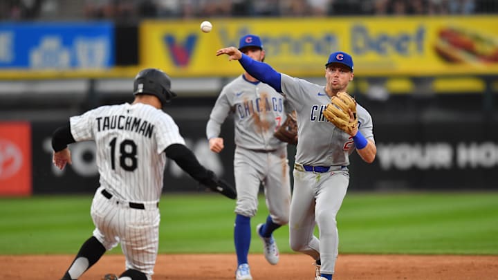 Jul 26, 2025; Chicago, Illinois, USA; Chicago Cubs second baseman Nico Hoerner (2) completes a double play after forcing out Chicago White Sox right fielder Mike Tauchman (18) during the sixth inning at Rate Field. Mandatory Credit: Patrick Gorski-Imagn Images Jul 26, 2025; Chicago, Illinois, USA; Chicago Cubs second baseman Nico Hoerner (2) completes a double play after forcing out Chicago White Sox right fielder Mike Tauchman (18) during the sixth inning at Rate Field. Mandatory Credit: Patrick Gorski-Imagn Images