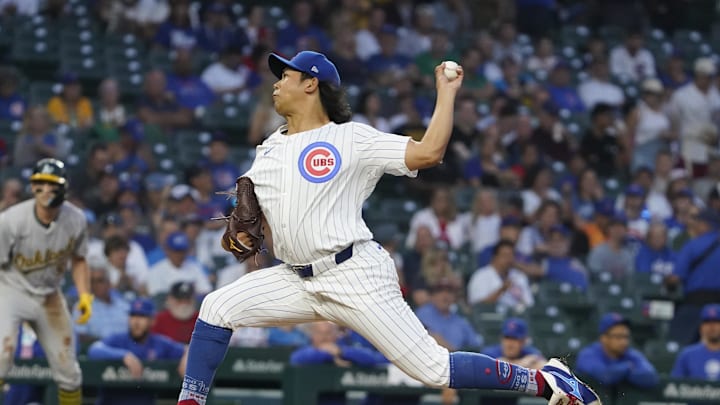 Sep 16, 2024; Chicago, Illinois, USA; Chicago Cubs pitcher Shota Imanaga (18) throws the ball against the Oakland Athletics during the first inning at Wrigley Field. Mandatory Credit: David Banks-Imagn Images