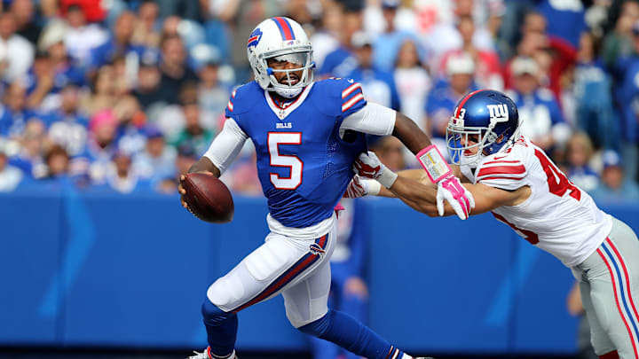 Bills quarterback Tyrod Taylor has to scramble in the end zone to escape Giants Craig Dahl. Taylor was pressure much of the game and sacked twice in a 24-10 loss to New York Bills quarterback Tyrod Taylor has to scramble in the end zone to escape Giants Craig Dahl. Taylor was pressure much of the game and sacked twice in a 24-10 loss to New York