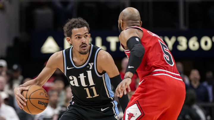 Feb 12, 2024; Atlanta, Georgia, USA; Atlanta Hawks guard Trae Young (11) dribbles against Chicago Feb 12, 2024; Atlanta, Georgia, USA; Atlanta Hawks guard Trae Young (11) dribbles against Chicago