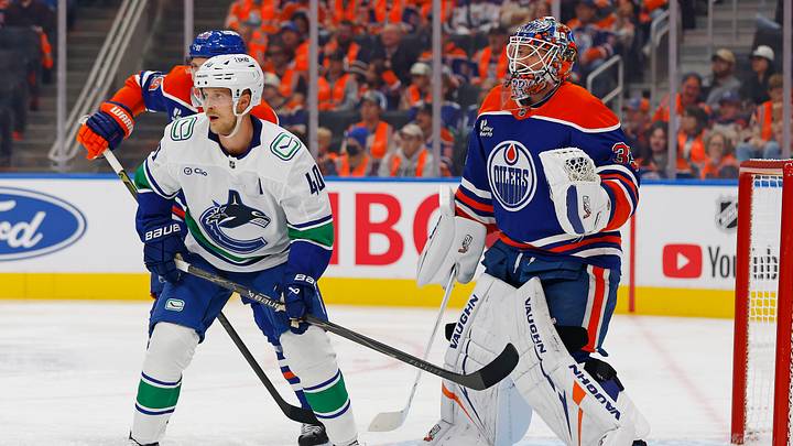 Sep 29, 2026; Edmonton, Alberta, CAN;  Vancouver Canucks forward Elias Pettersson (40) tries to screen  Edmonton Oilers goaltender Tristan Jarry (35) during the second period at Rogers Place.  Mandatory Credit: Perry Nelson-Imagn Images