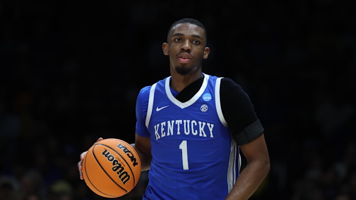 Lamont Butler (1) dribbles the ball against the Tennessee Volunteers during the 2025 NCAA tournament. 