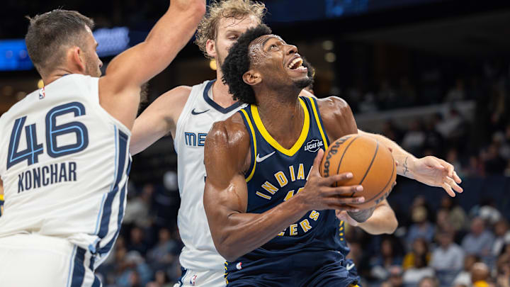 Oct 25, 2025; Memphis, Tennessee, USA; Indiana Pacers center James Wiseman (11) looks to shoot the ball against Memphis Grizzlies guard John Konchar (46) during the second half at FedExForum. Mandatory Credit: Wesley Hale-Imagn Images