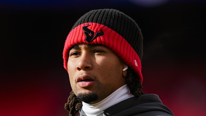 Jan 18, 2025; Kansas City, Missouri, USA; Houston Texans quarterback C.J. Stroud (7) warms up prior to a 2025 AFC divisional round game against the Kansas City Chiefs at GEHA Field at Arrowhead Stadium. Mandatory Credit: Jay Biggerstaff-Imagn Images