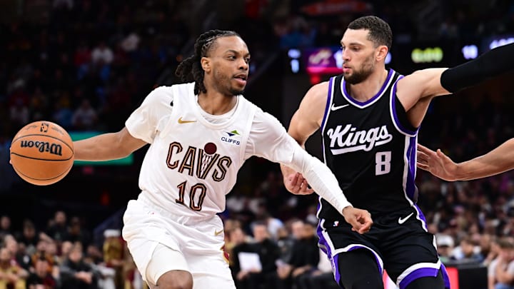 Apr 6, 2025; Cleveland, Ohio, USA; Cleveland Cavaliers guard Darius Garland (10) drives to the basket against Sacramento Kings guard Zach LaVine (8) during the second half at Rocket Arena. Mandatory Credit: Ken Blaze-Imagn Images