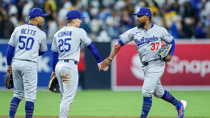 Jun 9, 2025; San Diego, California, USA; Los Angeles Dodgers right fielder Teoscar Hernandez (37) celebrates with Los Angeles Dodgers second baseman Tommy Edman (25) after defeating the San Diego Padres at Petco Park. Mandatory Credit: David Frerker-Imagn Images