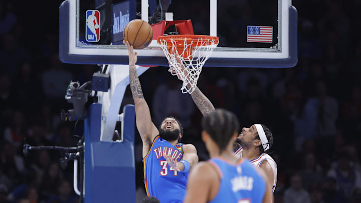 Mar 19, 2025; Oklahoma City, Oklahoma, USA; Oklahoma City Thunder forward Kenrich Williams (34) shoots from under the basket during a play against the Philadelphia 76ers during the second quarter at Paycom Center. Mandatory Credit: Alonzo Adams-Imagn Images Mar 19, 2025; Oklahoma City, Oklahoma, USA; Oklahoma City Thunder forward Kenrich Williams (34) shoots from under the basket during a play against the Philadelphia 76ers during the second quarter at Paycom Center. Mandatory Credit: Alonzo Adams-Imagn Images