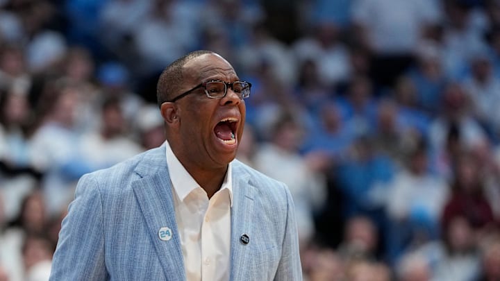 Dec 4, 2024; Chapel Hill, North Carolina, USA; North Carolina Tar Heels head coach Hubert Davis reacts in the second half at Dean E. Smith Center. Mandatory Credit: Bob Donnan-Imagn Images Dec 4, 2024; Chapel Hill, North Carolina, USA; North Carolina Tar Heels head coach Hubert Davis reacts in the second half at Dean E. Smith Center. Mandatory Credit: Bob Donnan-Imagn Images