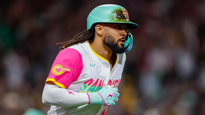 Sep 26, 2025; San Diego, California, USA; San Diego Padres right fielder Fernando Tatis Jr. (23) hits a grand slam home run during the fourth inning Arizona Diamondbacks at Petco Park. Mandatory Credit: David Frerker-Imagn Images Sep 26, 2025; San Diego, California, USA; San Diego Padres right fielder Fernando Tatis Jr. (23) hits a grand slam home run during the fourth inning Arizona Diamondbacks at Petco Park. Mandatory Credit: David Frerker-Imagn Images