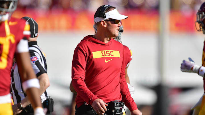Nov 16, 2024; Los Angeles, California, USA; Southern California Trojans head coach Lincoln Riley watches game action against the Nebraska Cornhuskers during the first half at the Los Angeles Memorial Coliseum. Mandatory Credit: Gary A. Vasquez-Imagn Images