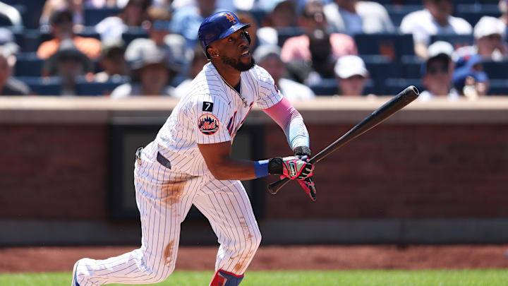 New York City, New York, USA; New York Mets left fielder Starling Marte (6) singles during the third inning against the New York Yankees at Citi Field.