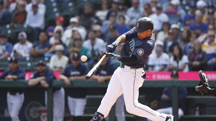 Seattle Mariners designated hitter Jorge Polanco (7) hits an RBI-sacrifice fly against the New York Yankees during the first inning at T-Mobile Park in 2024. Seattle Mariners designated hitter Jorge Polanco (7) hits an RBI-sacrifice fly against the New York Yankees during the first inning at T-Mobile Park in 2024.