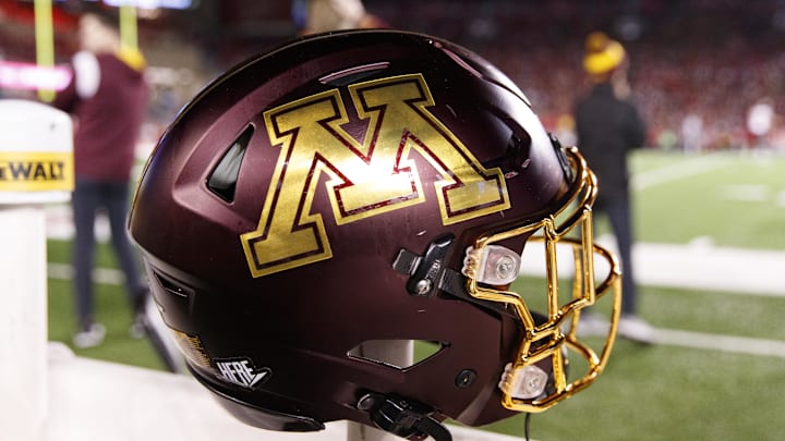 Nov 26, 2022; Madison, Wisconsin, USA; A Minnesota Golden Gophers helmet sits on the sidelines during the game against the Wisconsin Badgers at Camp Randall Stadium. Mandatory Credit: Jeff Hanisch-Imagn Images Nov 26, 2022; Madison, Wisconsin, USA; A Minnesota Golden Gophers helmet sits on the sidelines during the game against the Wisconsin Badgers at Camp Randall Stadium. Mandatory Credit: Jeff Hanisch-Imagn Images