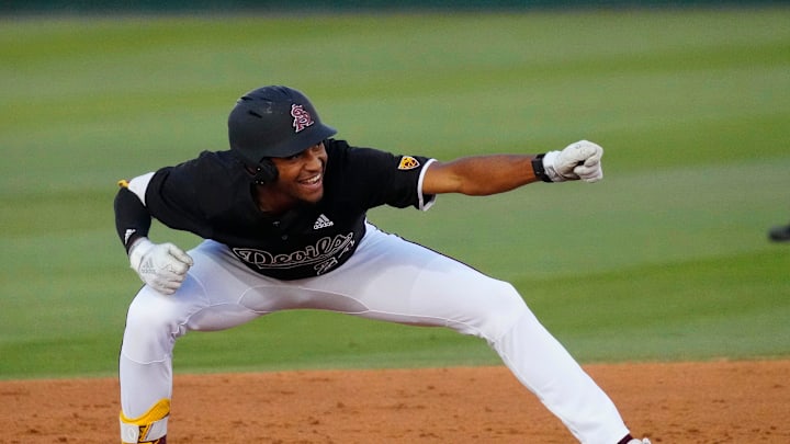 Isaiah Jackson of Arizona State University celebrates a double against Stanford during a game at Phoenix Municipal Stadium on May 6, 2023.