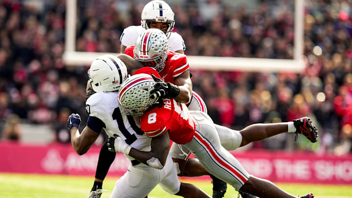 Ohio State Buckeyes linebacker Arvell Reese (8) and linebacker Sonny Styles (0) tackle Penn State Nittany Lions running back Nicholas Singleton (10) in the second half of the college football game at Ohio Stadium on Saturday, Nov. 1, 2025 in Columbus, Ohio. Ohio State Buckeyes linebacker Arvell Reese (8) and linebacker Sonny Styles (0) tackle Penn State Nittany Lions running back Nicholas Singleton (10) in the second half of the college football game at Ohio Stadium on Saturday, Nov. 1, 2025 in Columbus, Ohio.