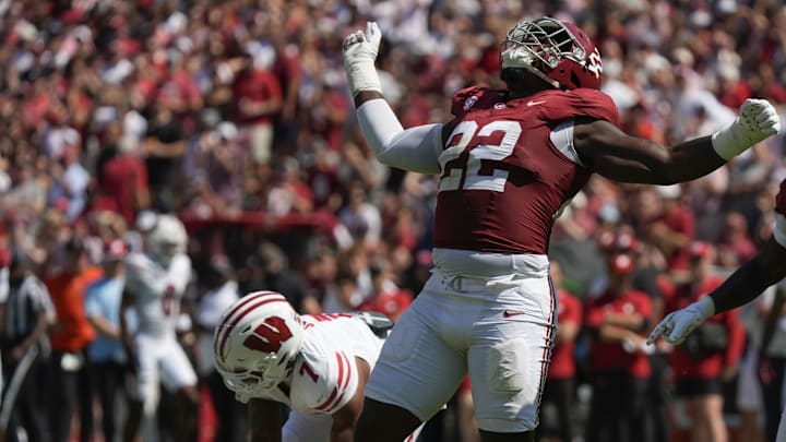 Sep 13, 2025; Tuscaloosa, Alabama, USA;  Alabama defensive lineman LT Overton (22) celebrates after sacking Wisconsin quarterback Danny O'Neil (18) at Saban Field at Bryant-Denny Stadium. Mandatory Credit: Gary Cosby-USA TODAY Network via Imagn Images