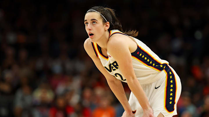 Jun 30, 2024; Phoenix, Arizona, USA; Indiana Fever guard Caitlin Clark (22) looks on during the first half of the game against the Phoenix Mercury at Footprint Center. 