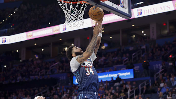 Dec 5, 2025; Oklahoma City, Oklahoma, USA; Oklahoma City Thunder guard Kenrich Williams (34) goes up for a basket against the Dallas Mavericks during the second half at Paycom Center. Mandatory Credit: Alonzo Adams-Imagn Images