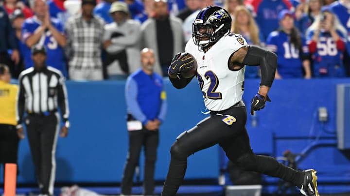 Sep 7, 2025; Orchard Park, New York, USA; Baltimore Ravens running back Derrick Henry (22) runs with the ball for a touchdown against the Buffalo Bills during the first half at Highmark Stadium. Mandatory Credit: Mark Konezny-Imagn Images