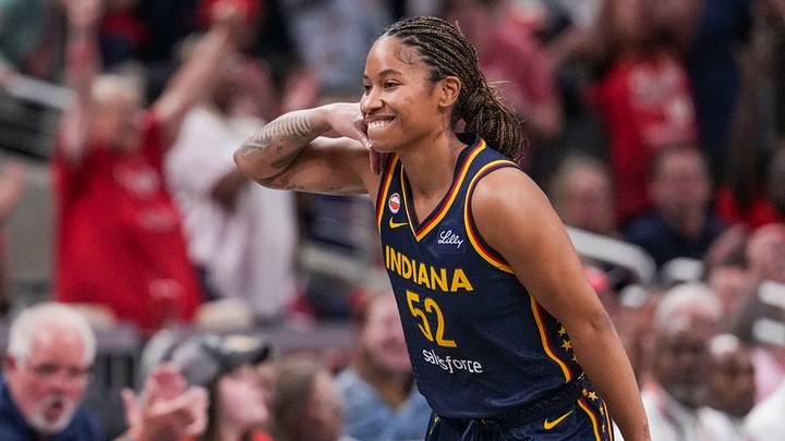Indiana Fever guard Tyasha Harris (52) celebrates a 3-pointer Saturday, June 27, 2026, during the first half of a game at Gainbridge Fieldhouse in Indianapolis. Indiana Fever guard Tyasha Harris (52) celebrates a 3-pointer Saturday, June 27, 2026, during the first half of a game at Gainbridge Fieldhouse in Indianapolis.