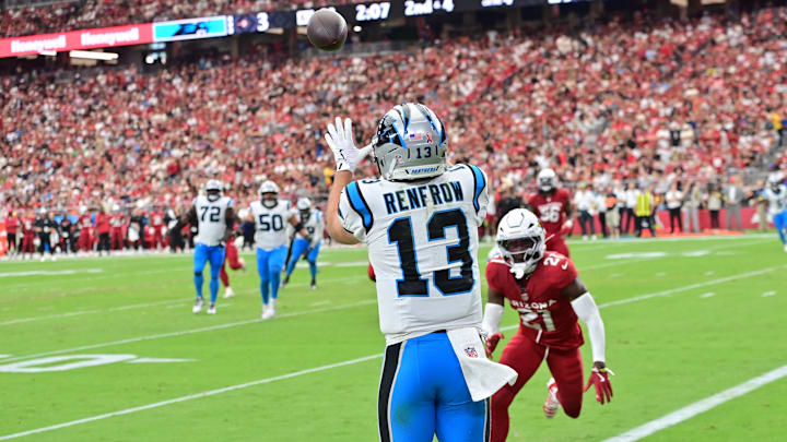 Sep 14, 2025; Glendale, Arizona, USA; Carolina Panthers wide receiver Hunter Renfrow (13) receives a pass to score a touchdown during the third quarter against the Arizona Cardinals at State Farm Stadium. Mandatory Credit: Matt Kartozian-Imagn Images Sep 14, 2025; Glendale, Arizona, USA; Carolina Panthers wide receiver Hunter Renfrow (13) receives a pass to score a touchdown during the third quarter against the Arizona Cardinals at State Farm Stadium. Mandatory Credit: Matt Kartozian-Imagn Images
