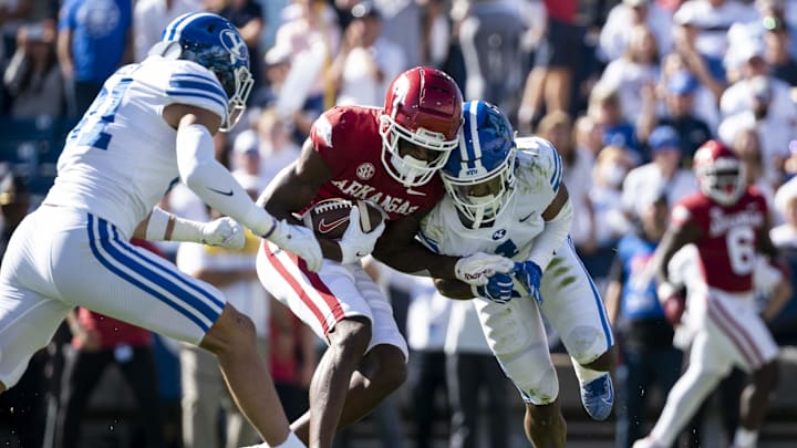 Oct 15, 2022; Provo, Utah, USA; Arkansas Razorbacks wide receiver Matt Landers (1) is blocked by Oct 15, 2022; Provo, Utah, USA; Arkansas Razorbacks wide receiver Matt Landers (1) is blocked by