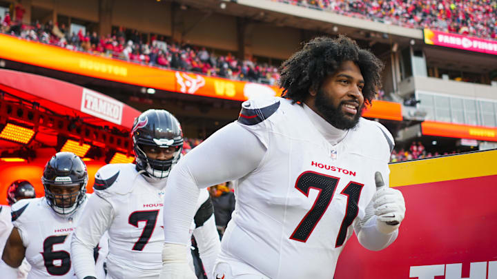Jan 18, 2025; Kansas City, Missouri, USA; Houston Texans offensive tackle Tytus Howard (71) takes the field prior to a 2025 AFC divisional round game against the Kansas City Chiefs at GEHA Field at Arrowhead Stadium. Mandatory Credit: Jay Biggerstaff-Imagn Images