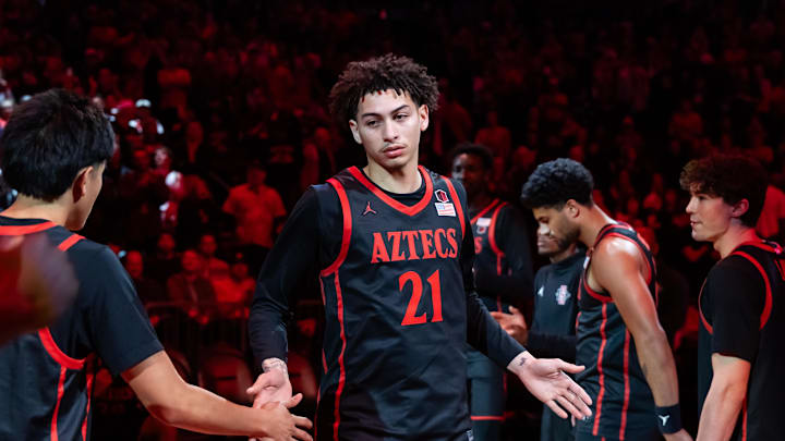 Dec 20, 2025; Phoenix, Arizona, USA; San Diego State Aztecs guard Miles Byrd (21) against the Arizona Wildcats during the Hall of Fame Series at Mortgage Matchup Center. Mandatory Credit: Mark J. Rebilas-Imagn Images