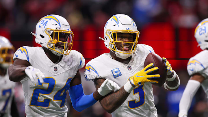 Dec 1, 2024; Atlanta, Georgia, USA; Los Angeles Chargers safety Derwin James Jr. (3) celebrates with safety Marcus Maye (24) and cornerback Tarheeb Still (29) after an interception against the Atlanta Falcons in the fourth quarter at Mercedes-Benz Stadium. Mandatory Credit: Brett Davis-Imagn Images