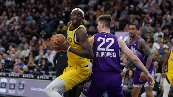 Feb 3, 2025; Salt Lake City, Utah, USA;  Indiana Pacers forward Pascal Siakam (43) spins around Utah Jazz forward Kyle Filipowski (22) and goes to the basket during the second half at Delta Center. Mandatory Credit: Chris Nicoll-Imagn Images