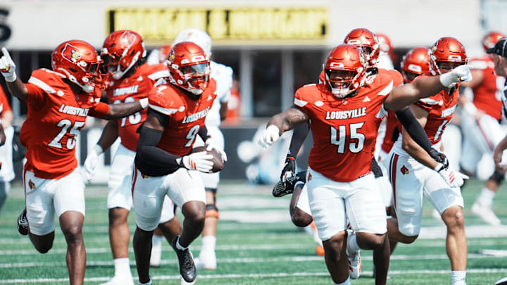 Louisville Cardinals linebacker Antonio Watts (9) celebrates his interception as Louisville Cardinals defensive lineman Denzel Lowry (45) cheers in the first half against Bowling Green at L&N Federal Credit Union Stadium in Louisville, Kentucky Sept. 20, 2025. Louisville Cardinals linebacker Antonio Watts (9) celebrates his interception as Louisville Cardinals defensive lineman Denzel Lowry (45) cheers in the first half against Bowling Green at L&N Federal Credit Union Stadium in Louisville, Kentucky Sept. 20, 2025.