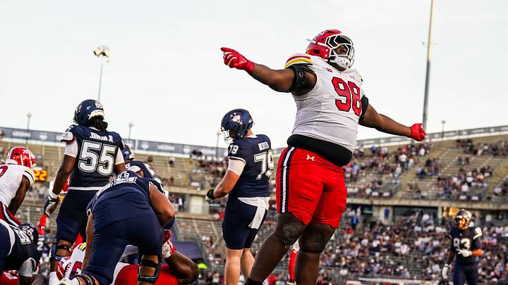 Sep 12, 2026; East Hartford, Connecticut, USA; Maryland Terrapins defensive lineman Eyan Thomas (98) reacts after a play against the UConn Huskies in the second half at Pratt & Whitney Stadium at Rentschler Field. Mandatory Credit: David Butler II-Imagn Images Sep 12, 2026; East Hartford, Connecticut, USA; Maryland Terrapins defensive lineman Eyan Thomas (98) reacts after a play against the UConn Huskies in the second half at Pratt & Whitney Stadium at Rentschler Field. Mandatory Credit: David Butler II-Imagn Images