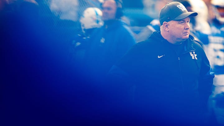 Nov 16, 2024; Lexington, Kentucky, USA; Kentucky Wildcats head coach Mark Stoops stands on the field before the game against the Murray State Racers at Kroger Field. Mandatory Credit: Jordan Prather-Imagn Images