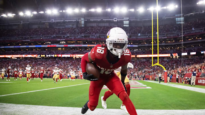 Jan 5, 2025; Glendale, Arizona, USA; Arizona Cardinals wide receiver Marvin Harrison Jr. (18) catches a touchdown pass against the San Francisco 49ers at State Farm Stadium. Mandatory Credit: Mark J. Rebilas-Imagn Images Jan 5, 2025; Glendale, Arizona, USA; Arizona Cardinals wide receiver Marvin Harrison Jr. (18) catches a touchdown pass against the San Francisco 49ers at State Farm Stadium. Mandatory Credit: Mark J. Rebilas-Imagn Images