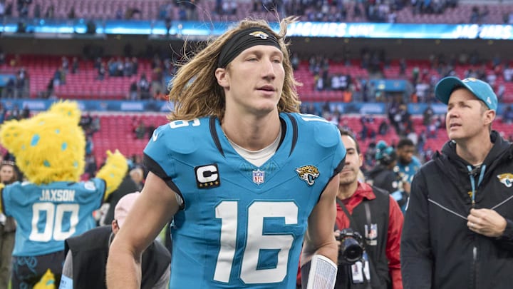 Oct 20, 2024; London, United Kingdom; Jacksonville Jaguars quarterback Trevor Lawrence (16) leaves the field after the game against the New England Patriots  during an NFL International Series game at Wembley Stadium. Mandatory Credit: Peter van den Berg-Imagn Images